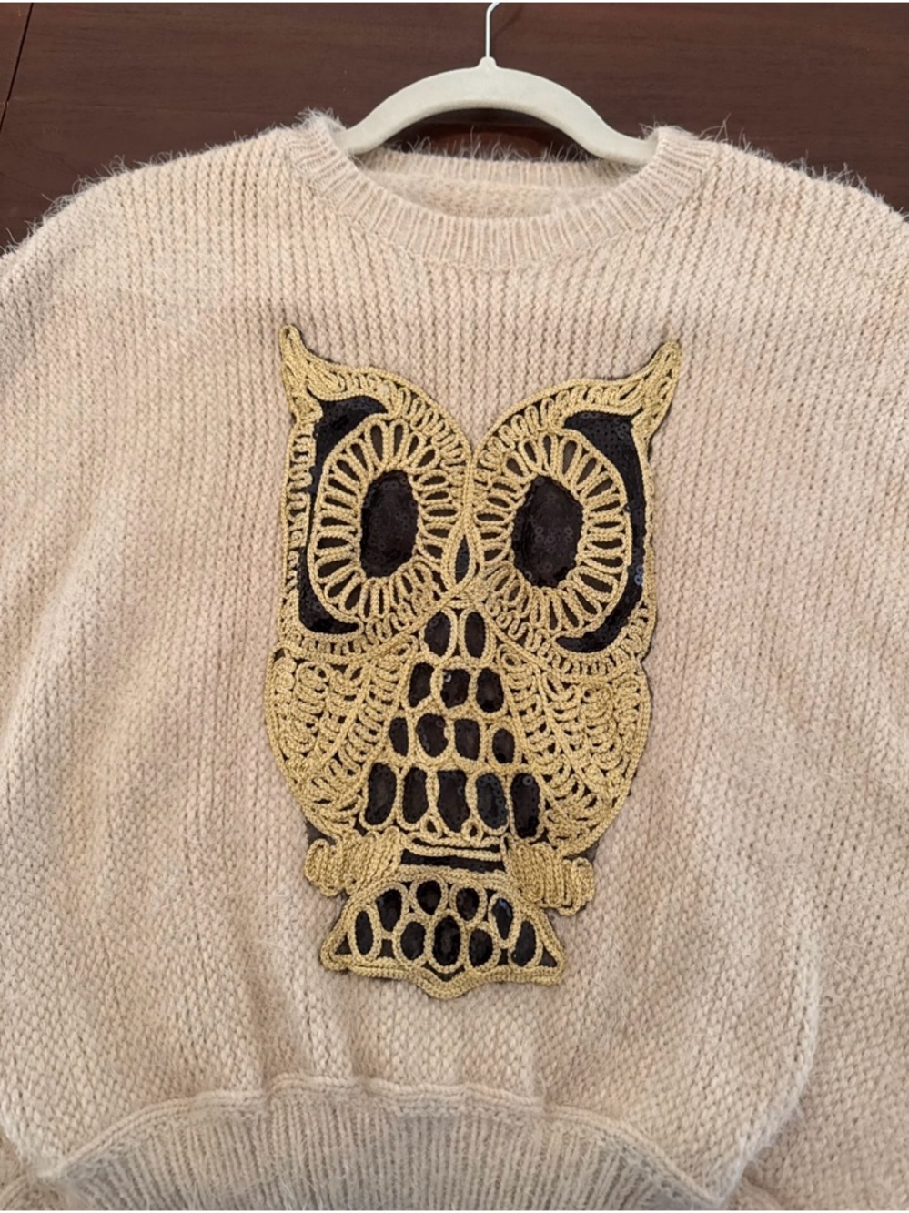 Anthropologie cream knit sweater with gold and black owl design motif embroidery